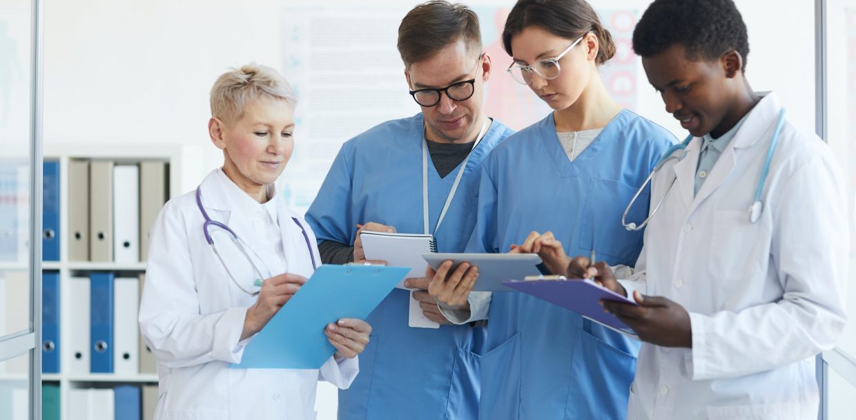 Multi-Ethnic Group of Doctors in Clinic